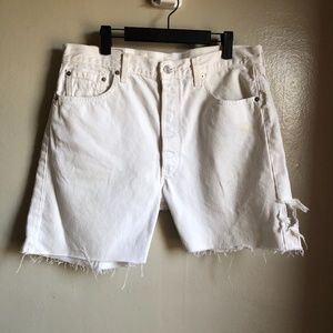 Levi’s distressed white denim cutoffs 501s 36”